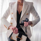 Trendy women's blazers with velvet gold buttons.